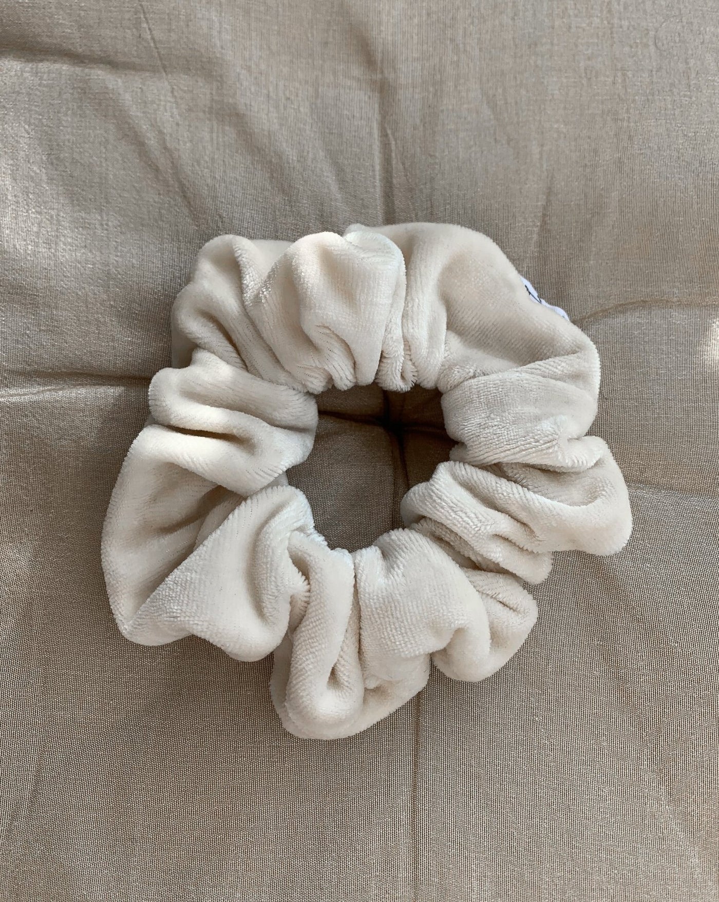 Luxurious cream bamboo organic cotton velvet velour scrunchie ethically handmade in Canada.