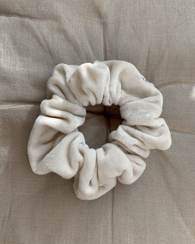 Luxurious cream bamboo organic cotton velvet velour scrunchie ethically handmade in Canada.