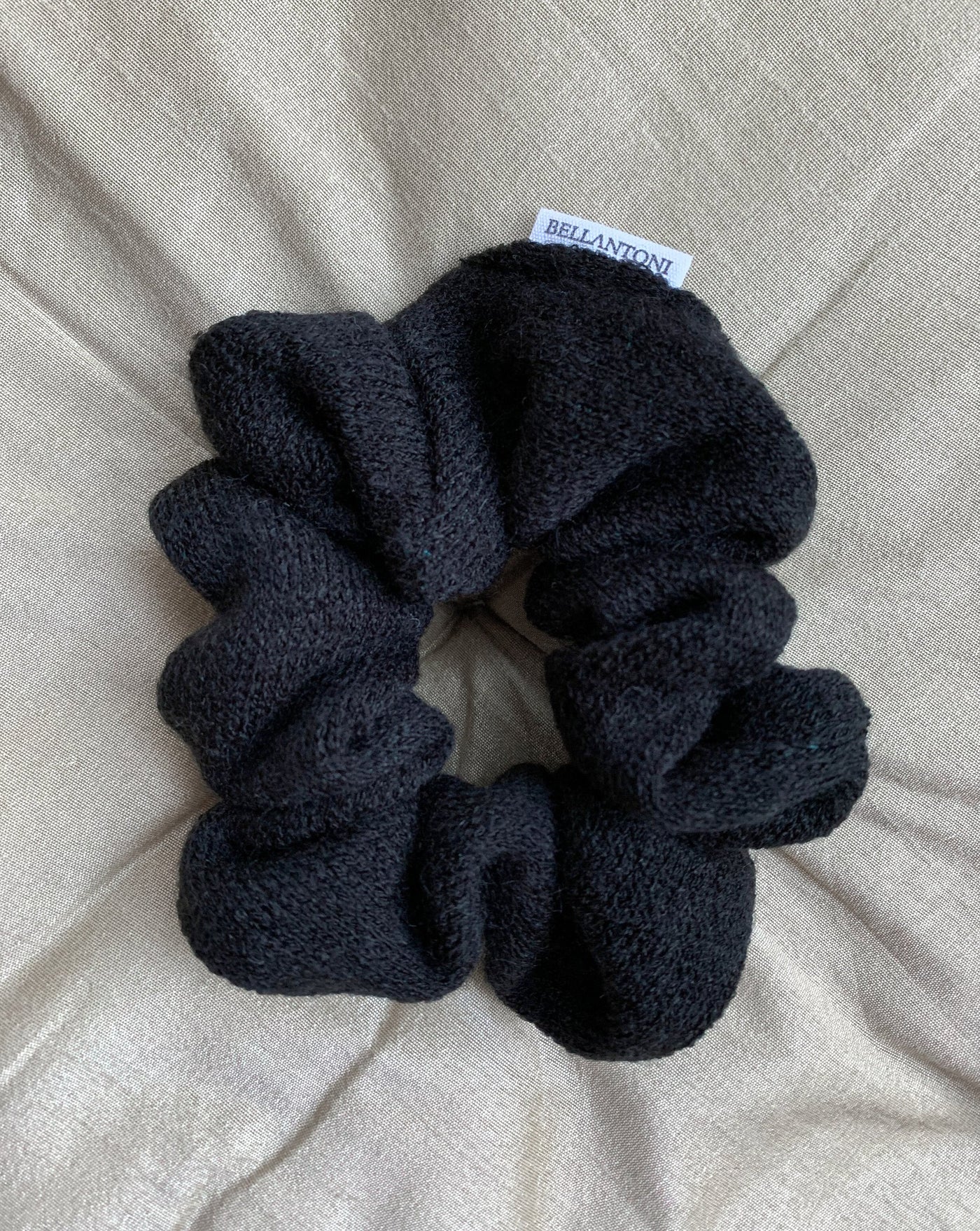 Black reclaimed sweater scrunchie ethically sewn in Canada.