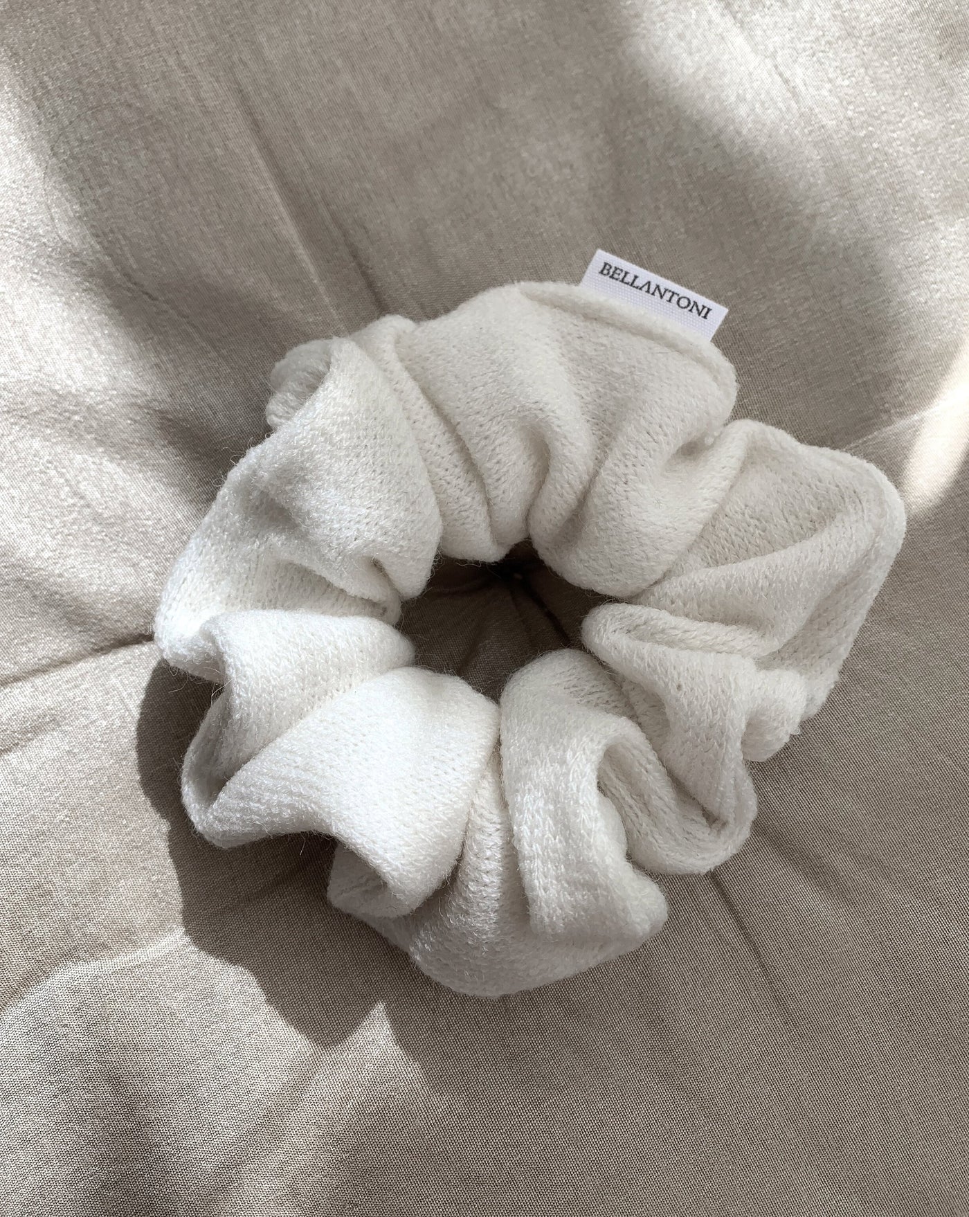 Cream oversized reclaimed sweater fabric scrunchie ethically sewn in Canada.