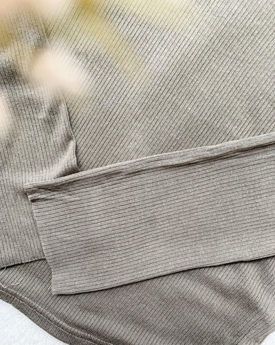 Ribbed Tencel Turtleneck in the colour Olive Green.