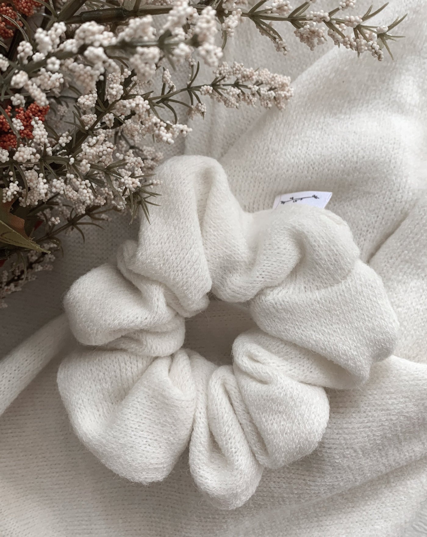 Cream oversized reclaimed sweater scrunchie ethically sewn in Canada.