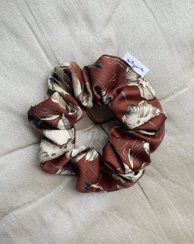 Reclaimed Sateen brown floral scrunchie flat lay.