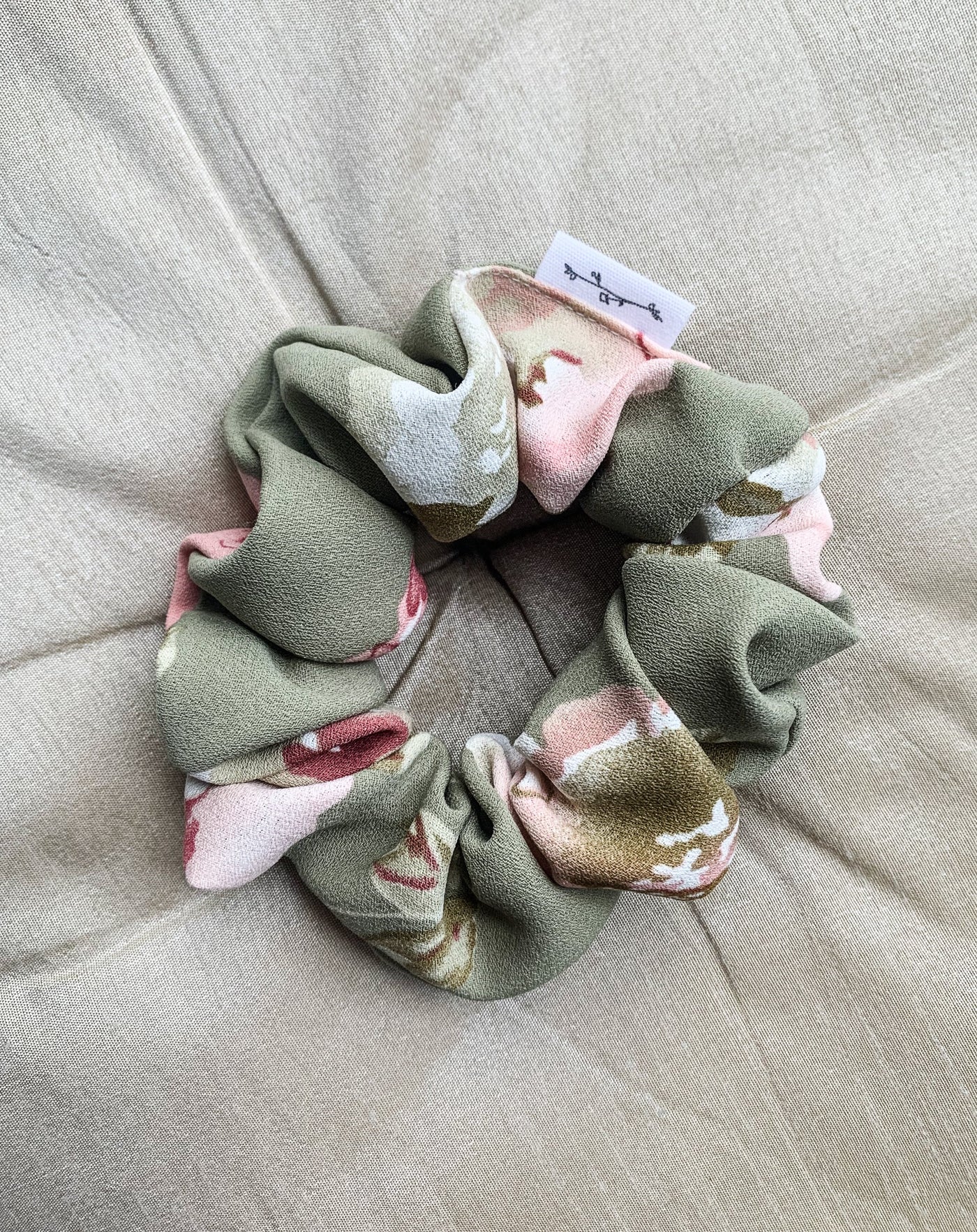 Floral green classic scrunchie flat lay.