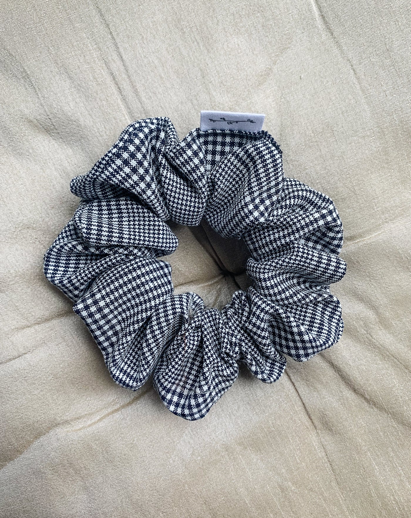 Reclaimed plaid check scrunchie flat lay