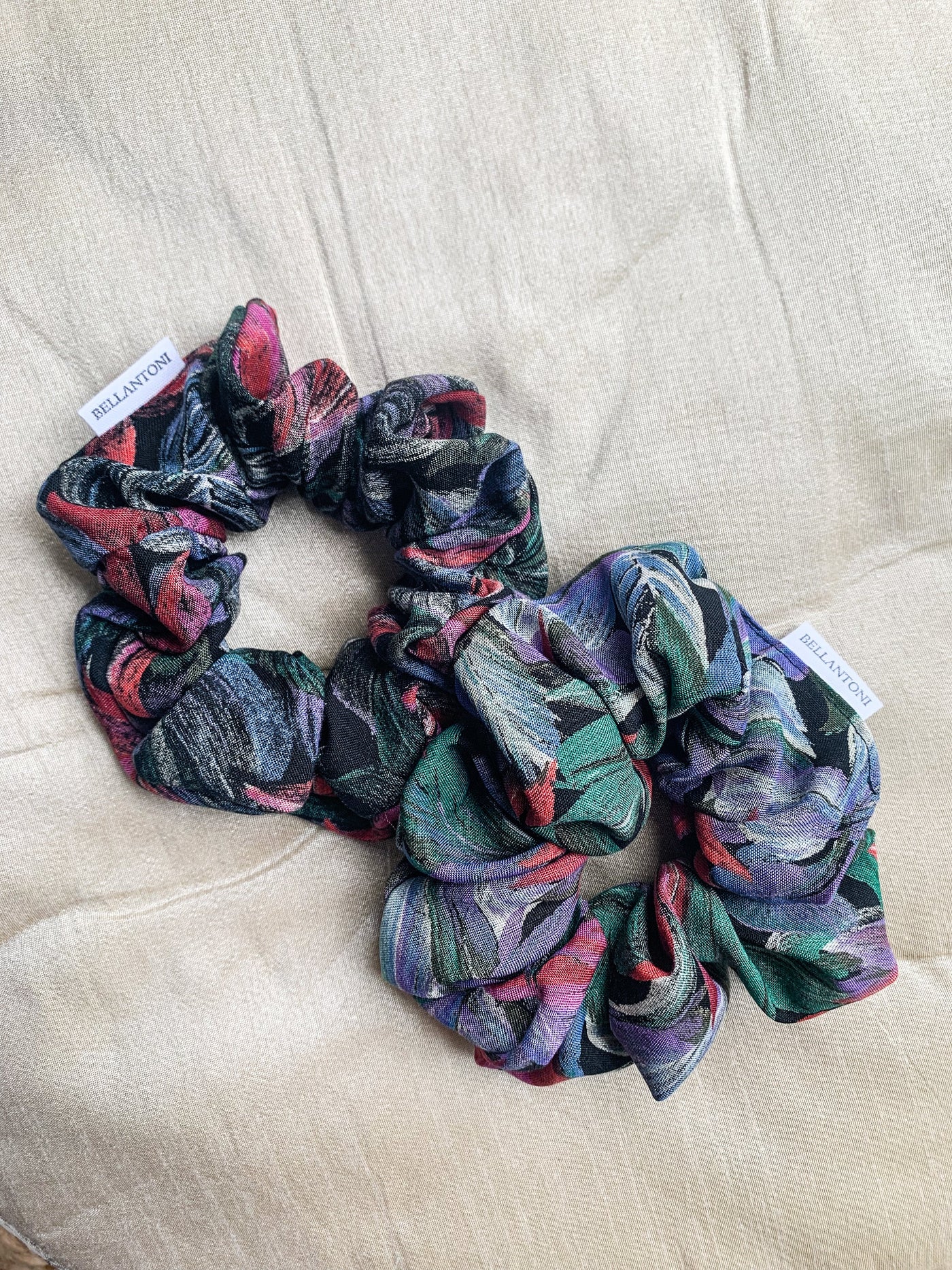 Two reclaimed tropical floral classic scrunchie flat lay.